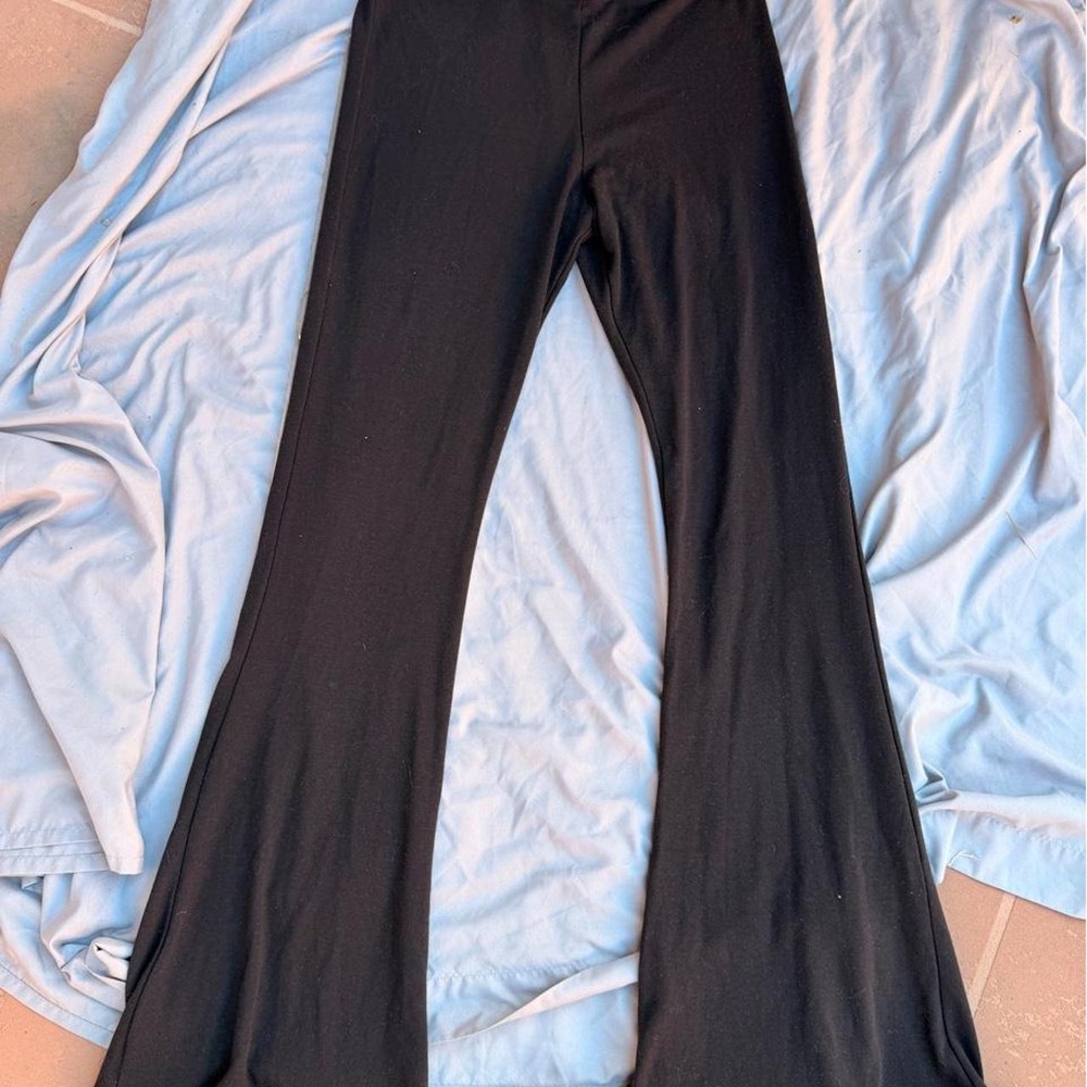 Black flare pants with ruffle hem new without tags